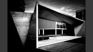 Architectural shot in black-and-white showcasing a building found at UBC