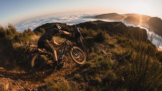 Rider on top of a mountain on the Trek Top Fuel Gen 4