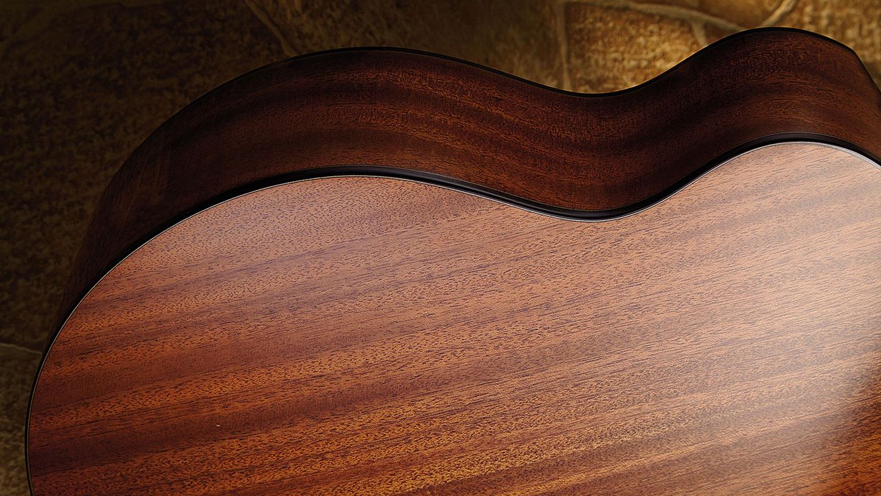 Along with the solid spruce top, all back and side woods are solid, too. This one is mahogany, but rosewood and maple are optional