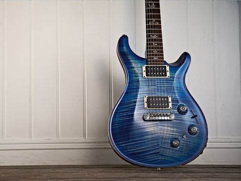 The faded finish almost looks aged in the way the plain maple pokes through the blue stain