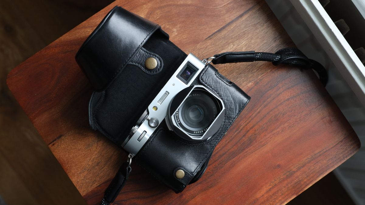 Fujifilm X100VI camera on a wooden table