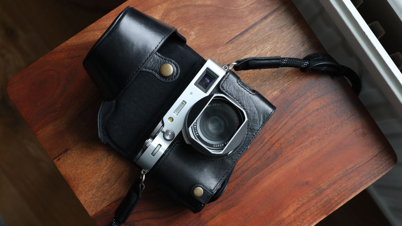 Fujifilm X100VI camera on a wooden table
