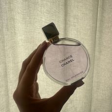 Shannon Lawlor holding a bottle of Chanel Chance Eau Splendide