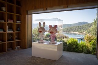 Takashi Murakami sculpted figures in glass case at Bodrum Loft / Perrotin exhibition