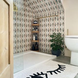 A bathroom with pattered tiles that remind one of a Hammam