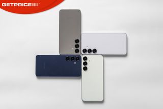 White background with image of four different coloured Samsung Galaxy S25 smartphones positioned around each other with the red GetPrice logo in the top left corner