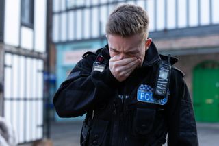 PC Sam Chen Williams gets hit in the face in Hollyoaks.