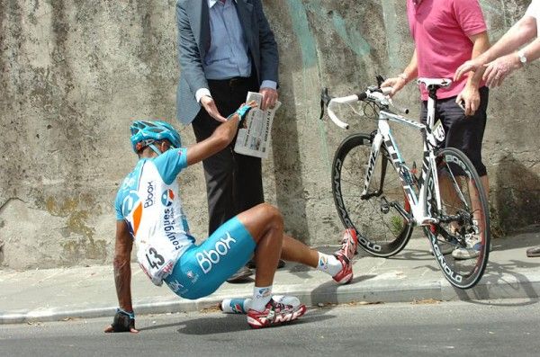 Yohann Gene (BBox Bouygues Telecom) gets up after crashing with Cavendish.