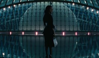 Westworld Tessa Thompson standing in front of a reflecting pool
