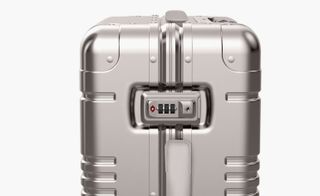 silver luggage bag