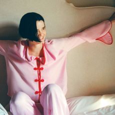 Woman in Sleeper pink pyjama set