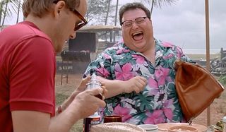 Jurassic Park Nedry laughing with a bag of money