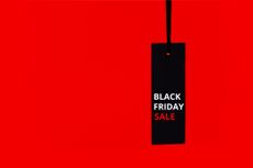 Black Friday sale tag silhouette on a red background