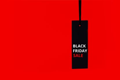 Black Friday sale tag silhouette on a red background