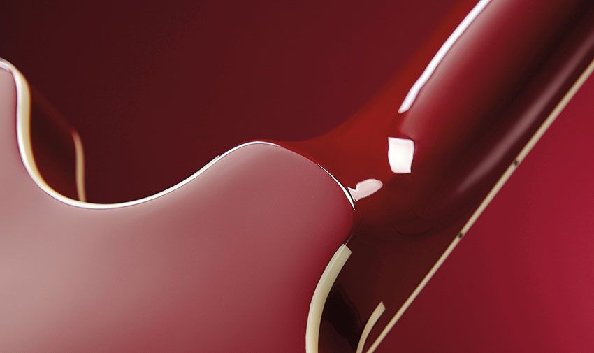 Twin cutaways and a set neck, in combination with the upper-horn strap button position, make for an easy ride at the top end