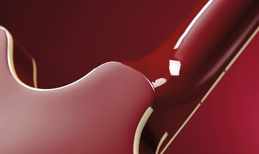 Twin cutaways and a set neck, in combination with the upper-horn strap button position, make for an easy ride at the top end