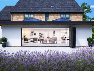 Bi-fold doors and rooflights bring in the light and create a garden connection