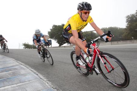 Overall race leader Alison Powers (NOW-Novartis) dives into the corkscrew section of the Laguna Seca raceway