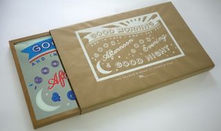 A screenprinted and numbered kraft paper encloses the mirror and packaging before being boxed and shipped