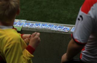 fans with Everton trading cards during the Pre-Season Friendly match between Milton Keynes Dons and Everton at Stadium mk on July 26, 2016 in Milton Keynes, England