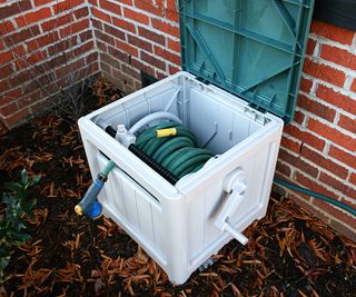 A garden hose box