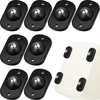 Eight small black adhesive appliance rollers with silver ball bearings. 