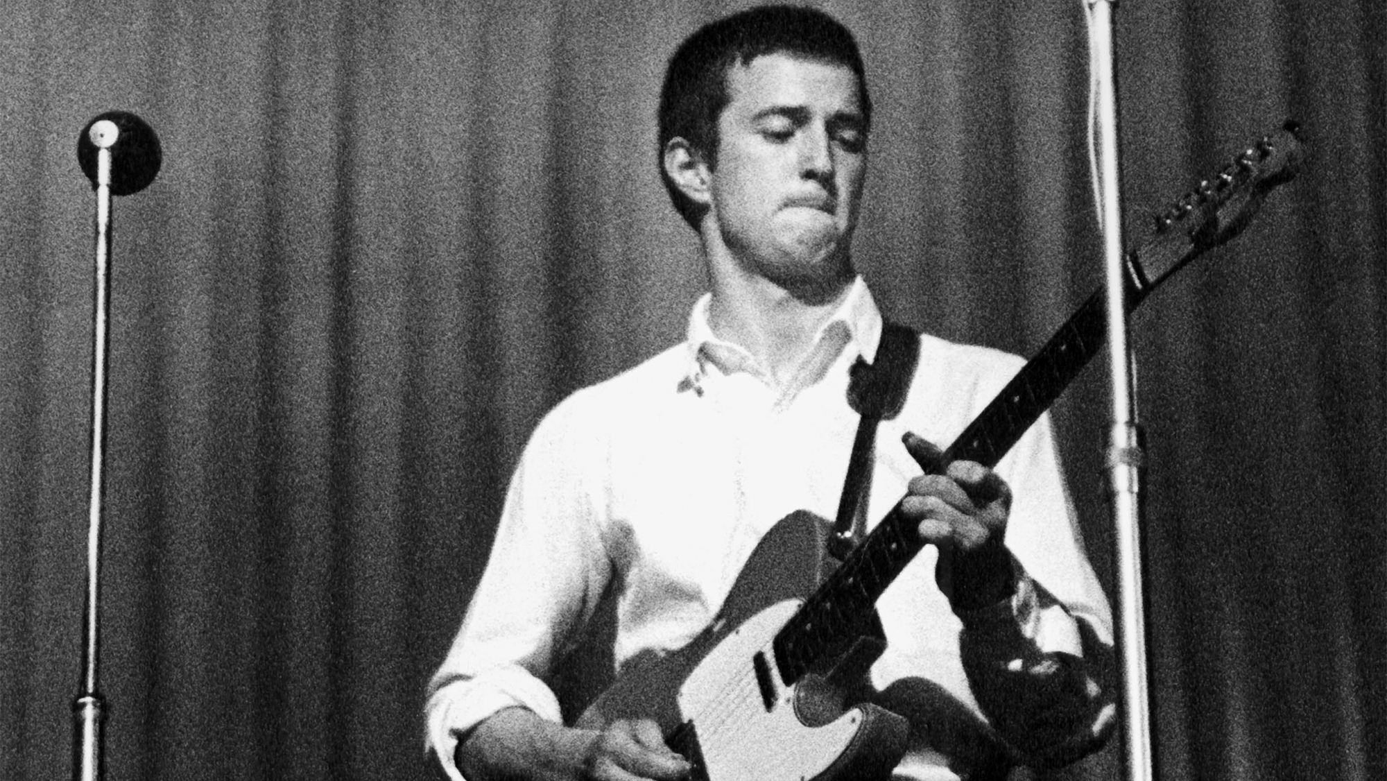 Eric Clapton of The Yardbirds performing live onstage, playing a Fender Telecaster guitar during a concert at The Dome in Brighton on 11th June 1964.