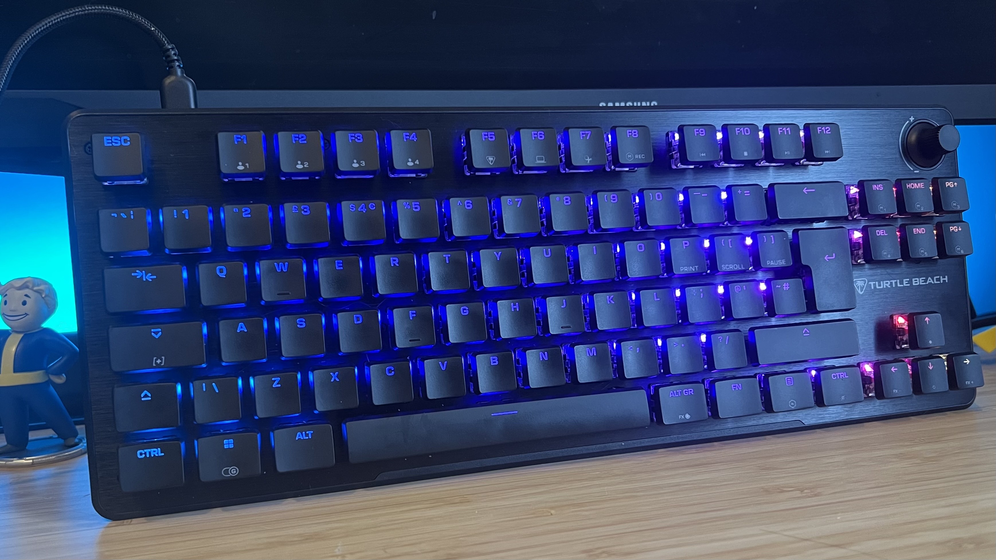 Turtle Beach Vulcan II TKL gaming keyboard on a wooden desk