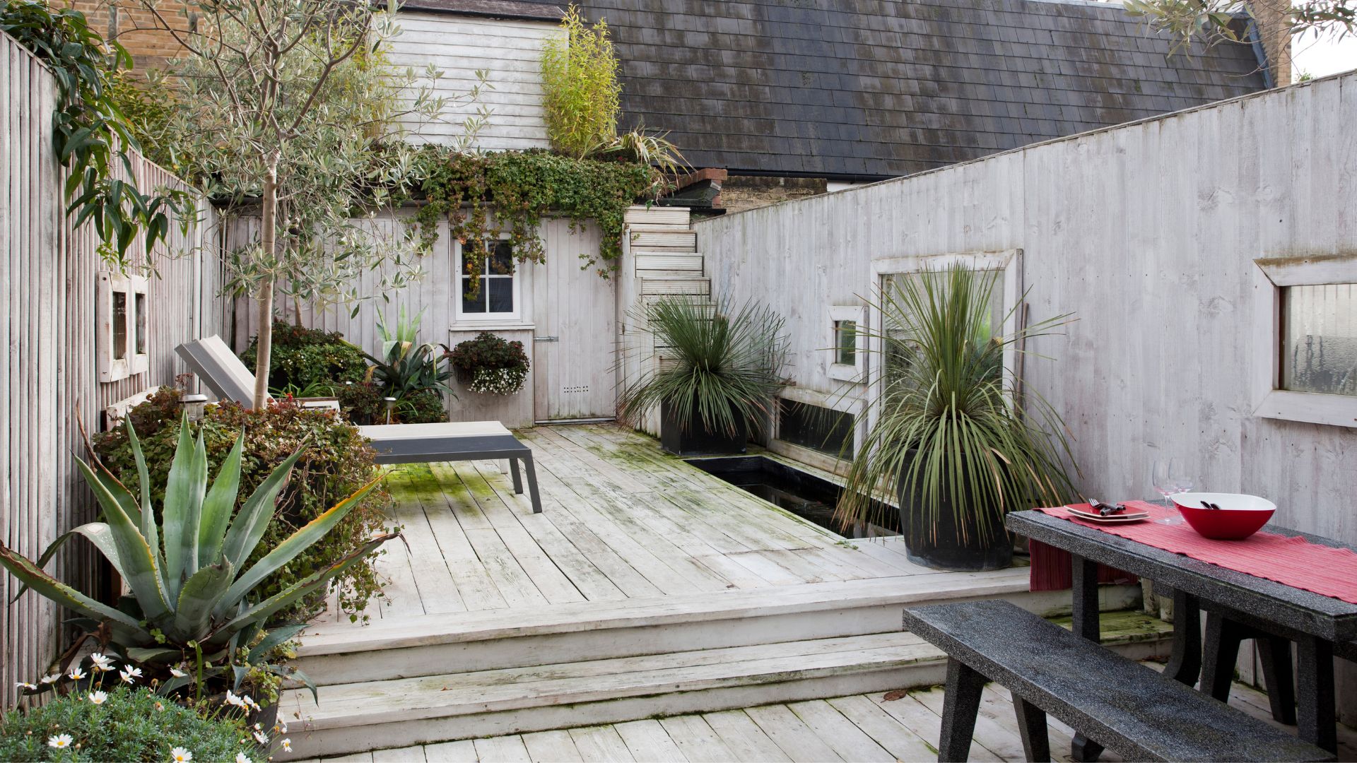 decking with various pieces of garden furniture on it