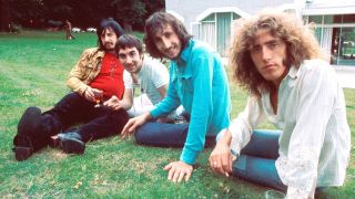 The Who in 1971, sitting on grass