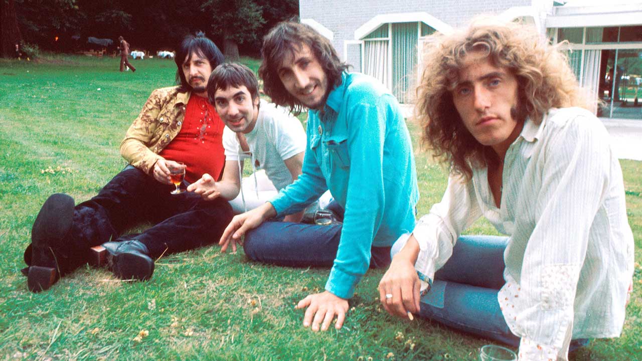 The Who in 1971, sitting on grass