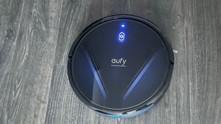 The top of the Eufy RoboVac G20 while its cleaning hard floor