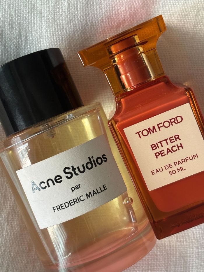 Two peach perfumes from Acne Studios and Tom Ford