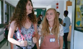 Eighth Grade Kayla walks through high school with her escort
