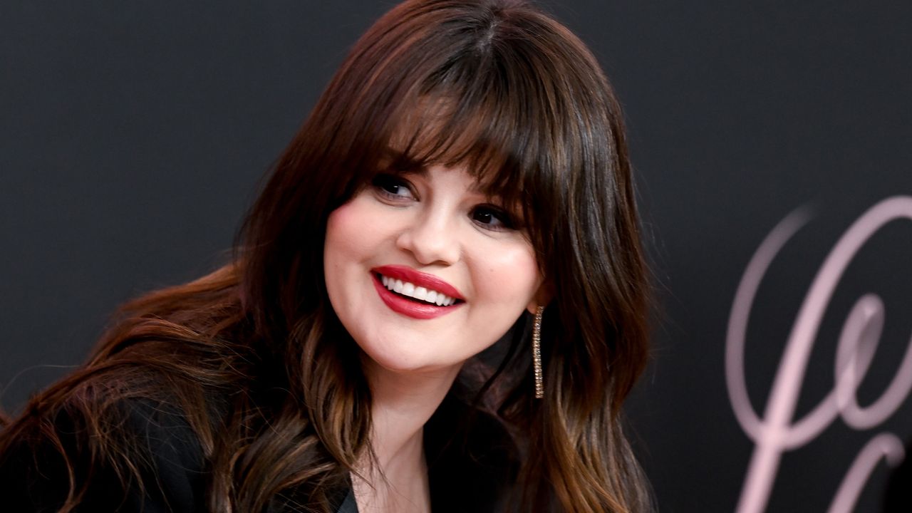 Selena Gomez attends the Lola premiere with thick bangs