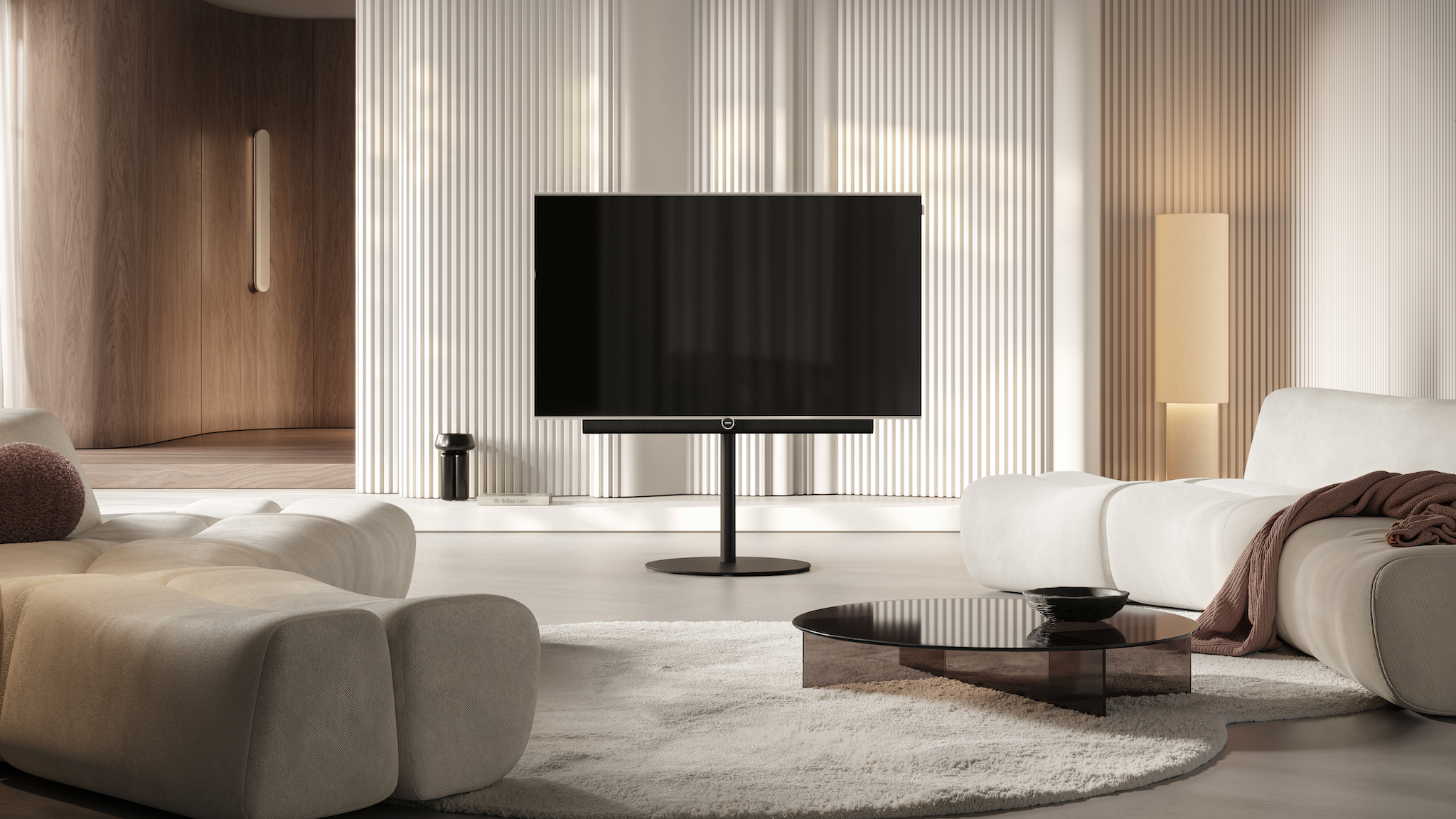 Lifestyle image of the Loewe Antares TV in a neutrally decorated living room