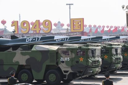 Military vehicles carrying DF-17 missiles parade through Tiananmen Square in Beijing on Oct. 1, 2019, celebrating the 70th anniversary of the founding of the Peoples Republic of China.