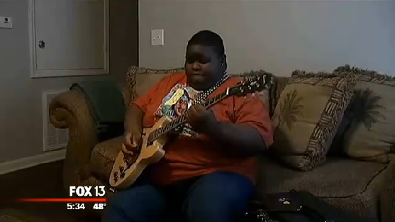 young blues guitar player