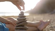 A woman enjoys a relaxing day at the beach.