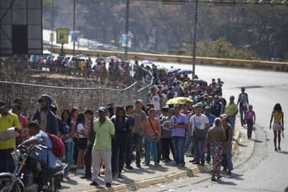 Waiting in line for hours is now a regular occurrence in Venezuela. 