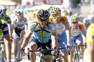 Lance Armstrong (Astana) comes across the line after stage 16.