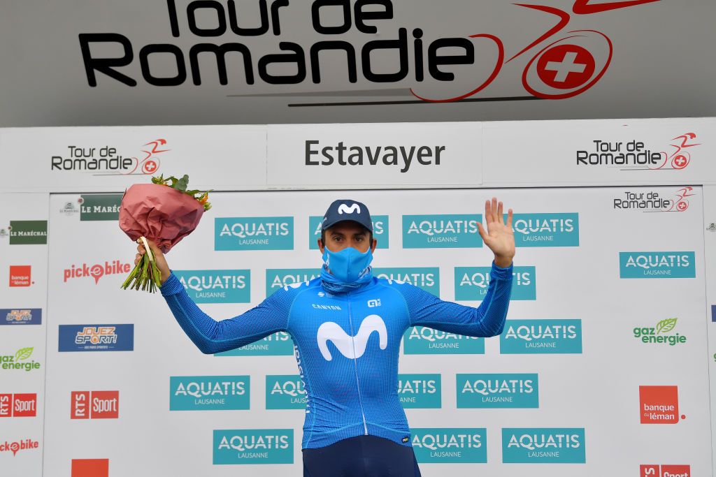 ESTAVAYER SWITZERLAND APRIL 30 Marc Soler Gimenez of Spain and Movistar Team celebrates at podium during the 74th Tour De Romandie 2021 Stage 3 a 1687km stage from Estavayer to Estavayer Mask Covid safety measures Flowers TDR2021 TDRnonstop UCIworldtour on April 30 2021 in Estavayer Switzerland Photo by Luc ClaessenGetty Images