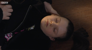 Lily Slater falls down the stairs in EastEnders