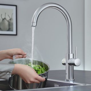 kitchen sink with hot water tap