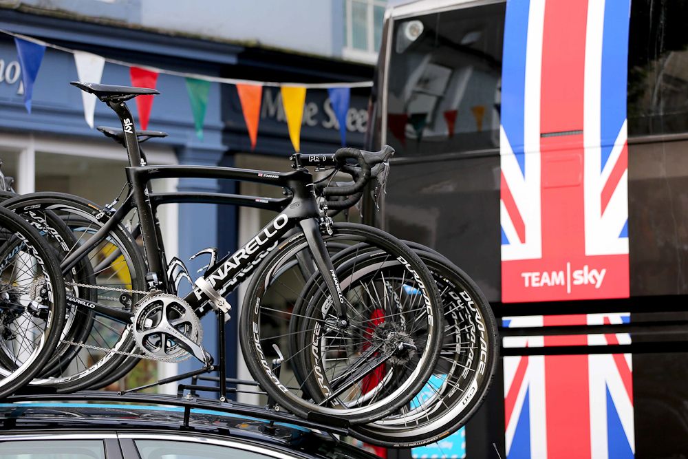 Team Sky bikes on the team car's roof rack.