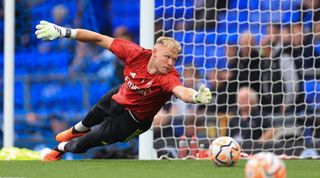 Arsenal goalkeeper Aaron Ramsdale warming up prior to the Premier League match between Everton FC and Arsenal FC at Goodison Park on September 17, 2023 in Liverpool, United Kingdom.
