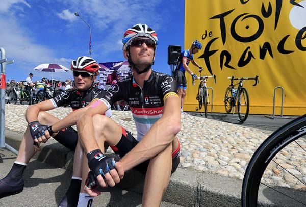 RadioShack-Nissan's Chris Horner and Franck Schleck relax before the start of stage 5.
