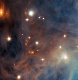 This NASA/ESA Hubble Space Telescope image shows an outer part of the Orion Nebula's little brother, Messier 43, sometimes referred to as De Mairan's Nebula after its discoverer. Only a dark lane of dust separates it from the Orion Nebula (Messier 42).