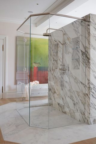 modern bathroom with large marble walk in shower