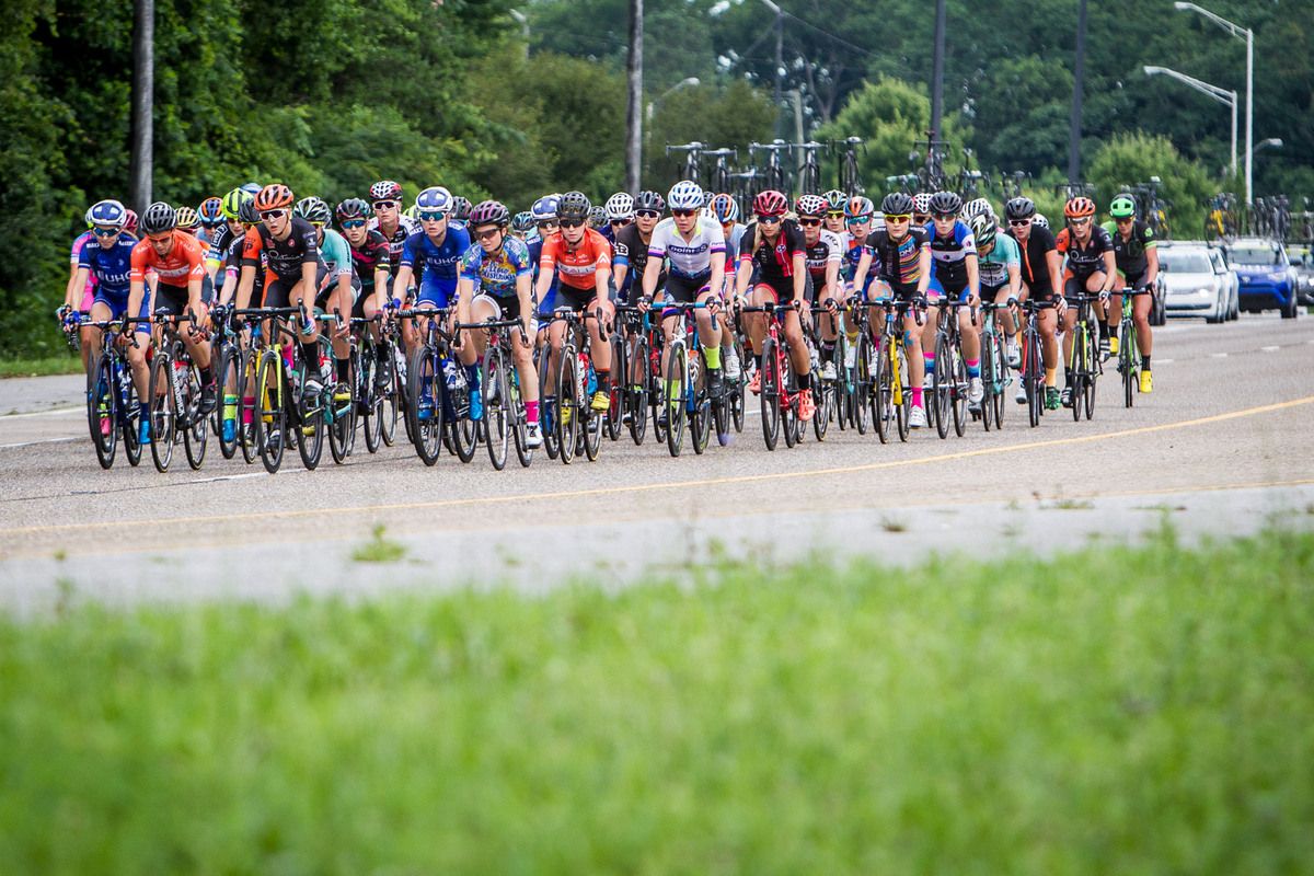 The womens field rides together early in the day